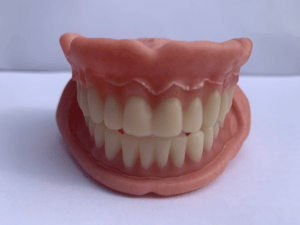 Good Habits to Follow When Living with Denture Implants
